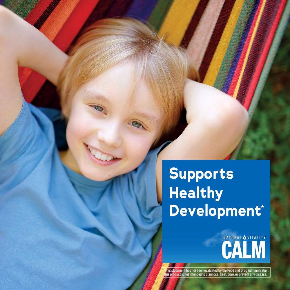 Natural Vitality Kids Calm glass with berry drink for calm moments.