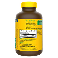 Nature Made Magnesium Glycinate bottle open cap with capsules ready to take.