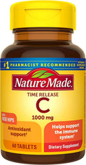 Close-up of Nature Made Time-Release Vitamin C tablets with rose hips for daily wellness.