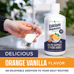 Nature's Liquids orange-vanilla liquid being poured for convenient daily mineral support.