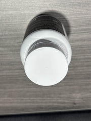 Compact travel bottle of Nature’s NutriWave VigorBoost gummies.
