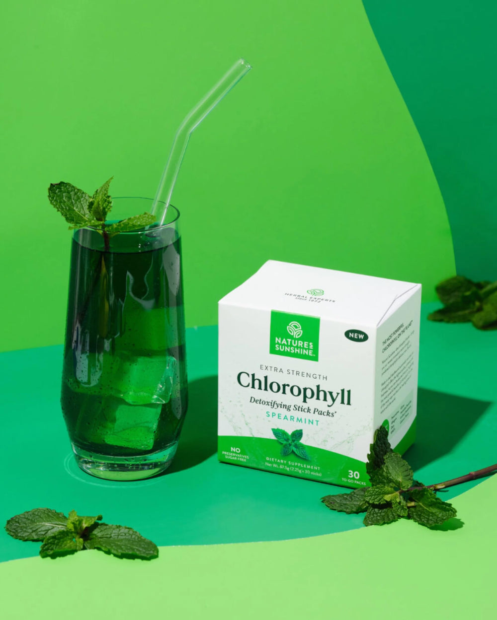 Nature's Sunshine Chlorophyll stick pack in glass yields a vibrant, refreshing drink.