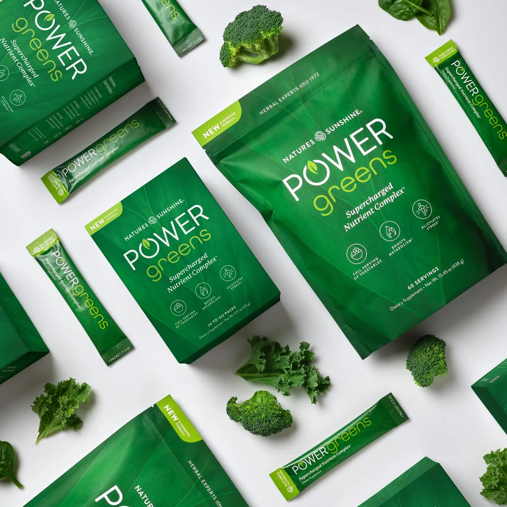 Nature's Sunshine Power Greens glass shaker scene suggests quick, tasty shakes.