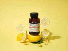 Nature's Sunshine Super Omega-3 EPA 180 Softgels capsules poured into a spoon illustrate dose.