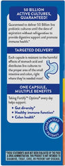Product bottle open with Fortify Optima capsules spilled on a surface.