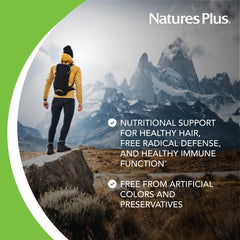 NaturesPlus AgeLoss Hair Support capsules closeup emphasizing extended release design.