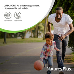 Magnesium tablets poured into a glass for easy daily routine with NaturesPlus.