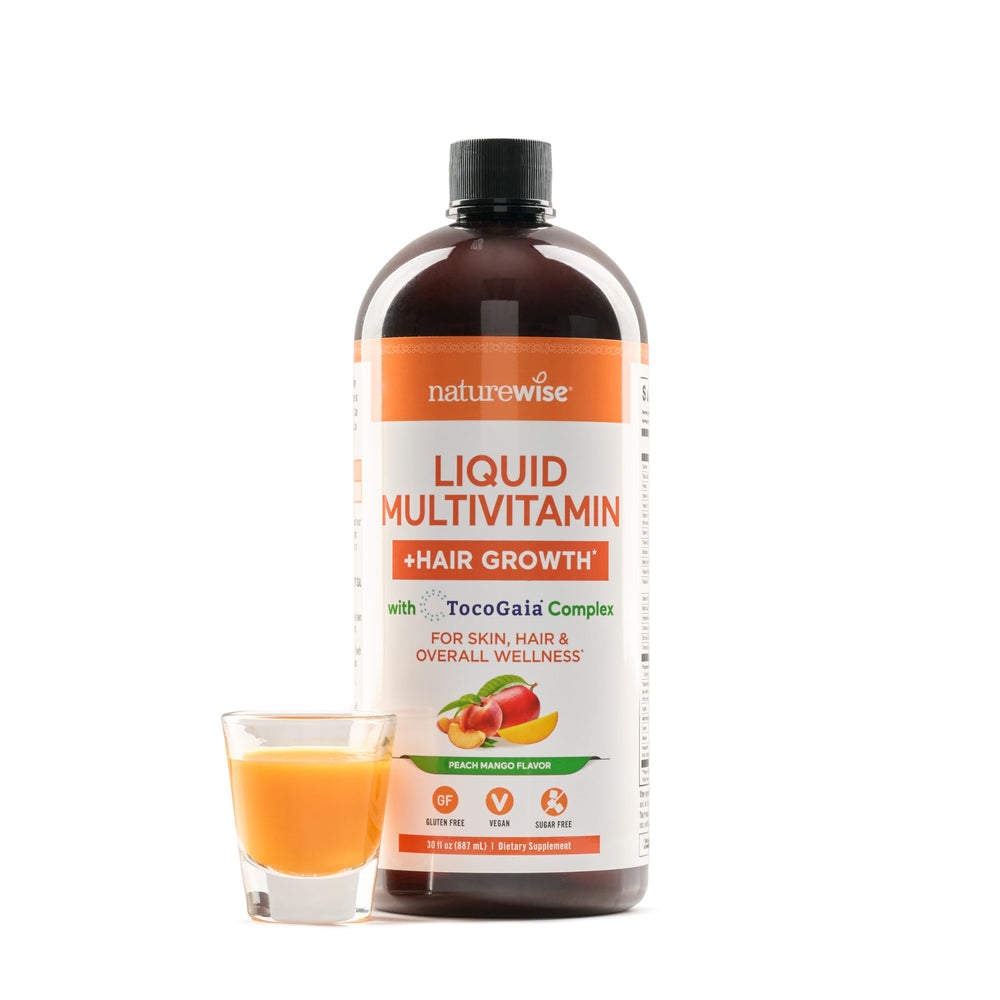 NatureWise Liquid Multivitamin Hair Growth bottle boosts daily wellness and hair support.