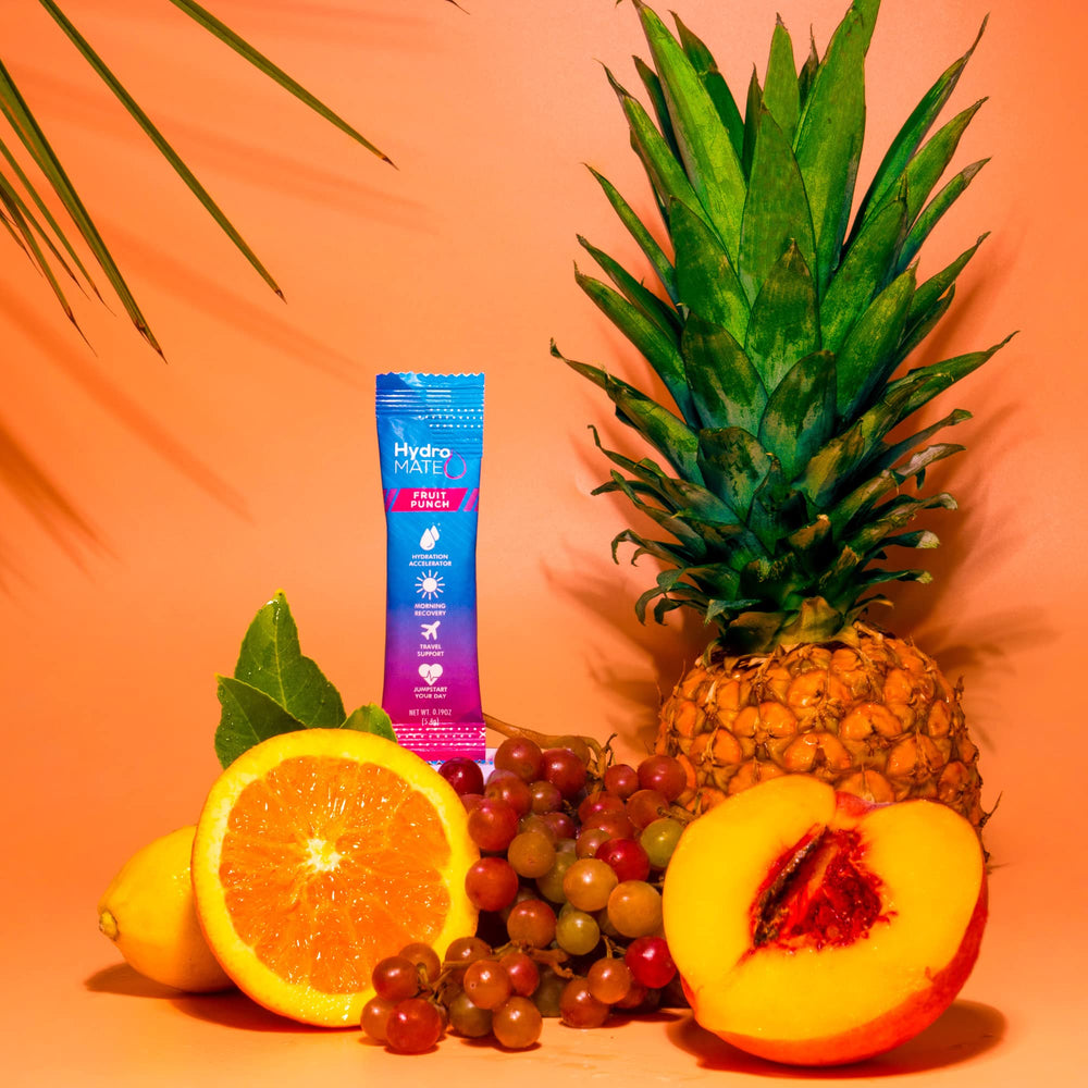 NatureWorks HydroMATE fruit punch pour into a glass for a refreshing sip.