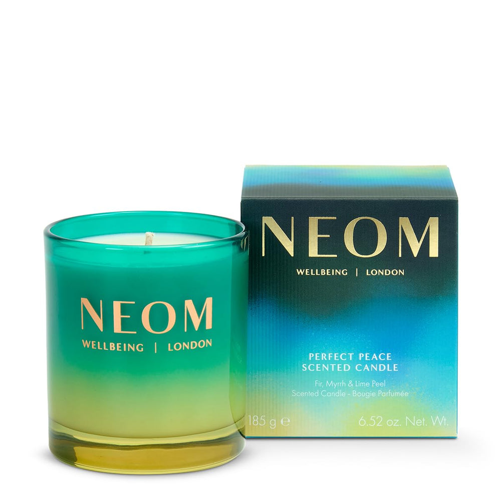 NEOM Perfect Peace 1 Wick Candle glows softly with fir, myrrh and lime for calm ambience.