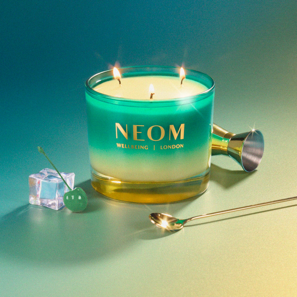 NEOM Perfect Peace jar shows essential oils and golden glow for calm