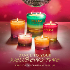 NEOM Sparkling Joy giftable candle tin enhances festive gifting.
