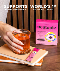 Neutonic glass of water with a stick dissolving for quick focus