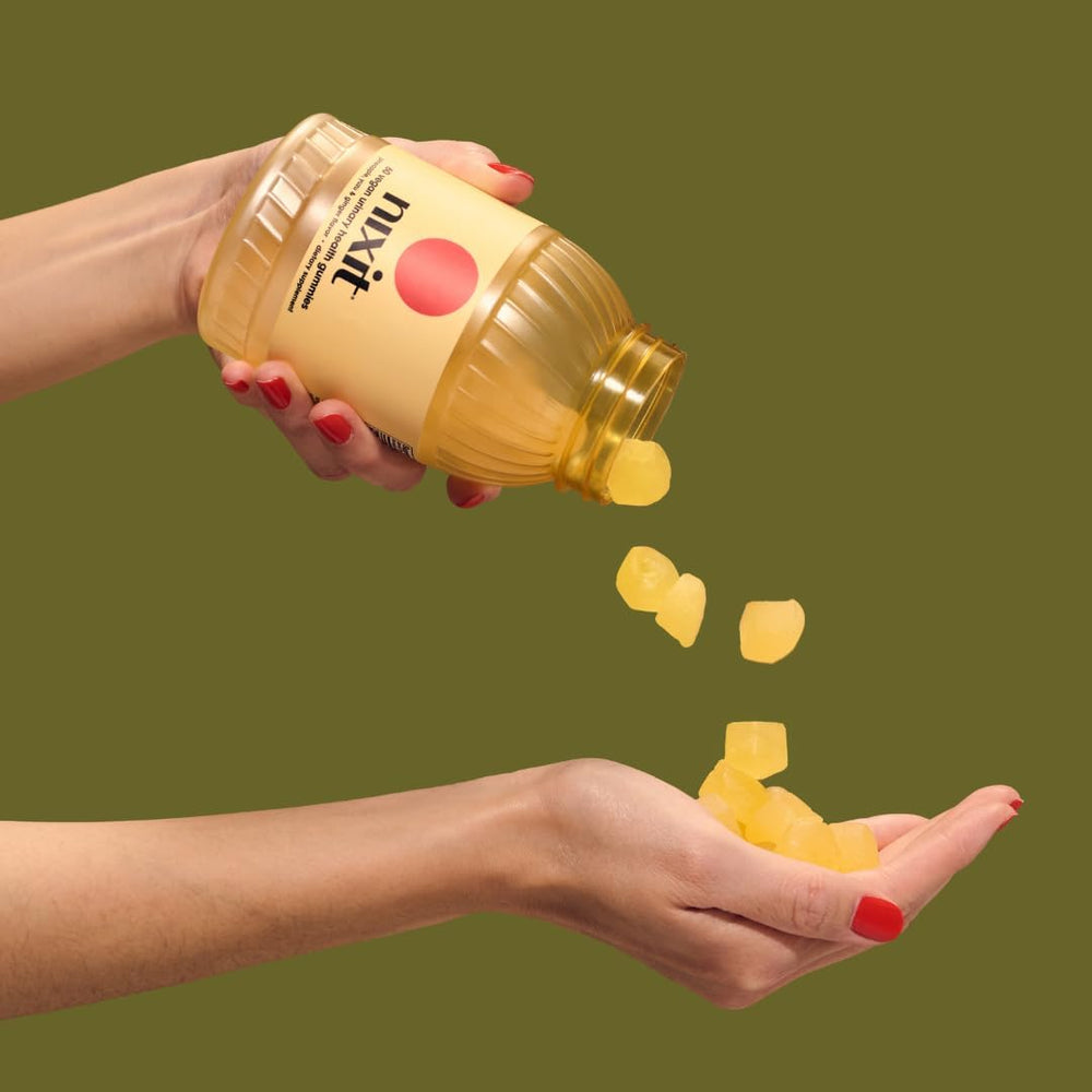 Nixit gummies pouring to emphasize ease of daily urinary tract care.