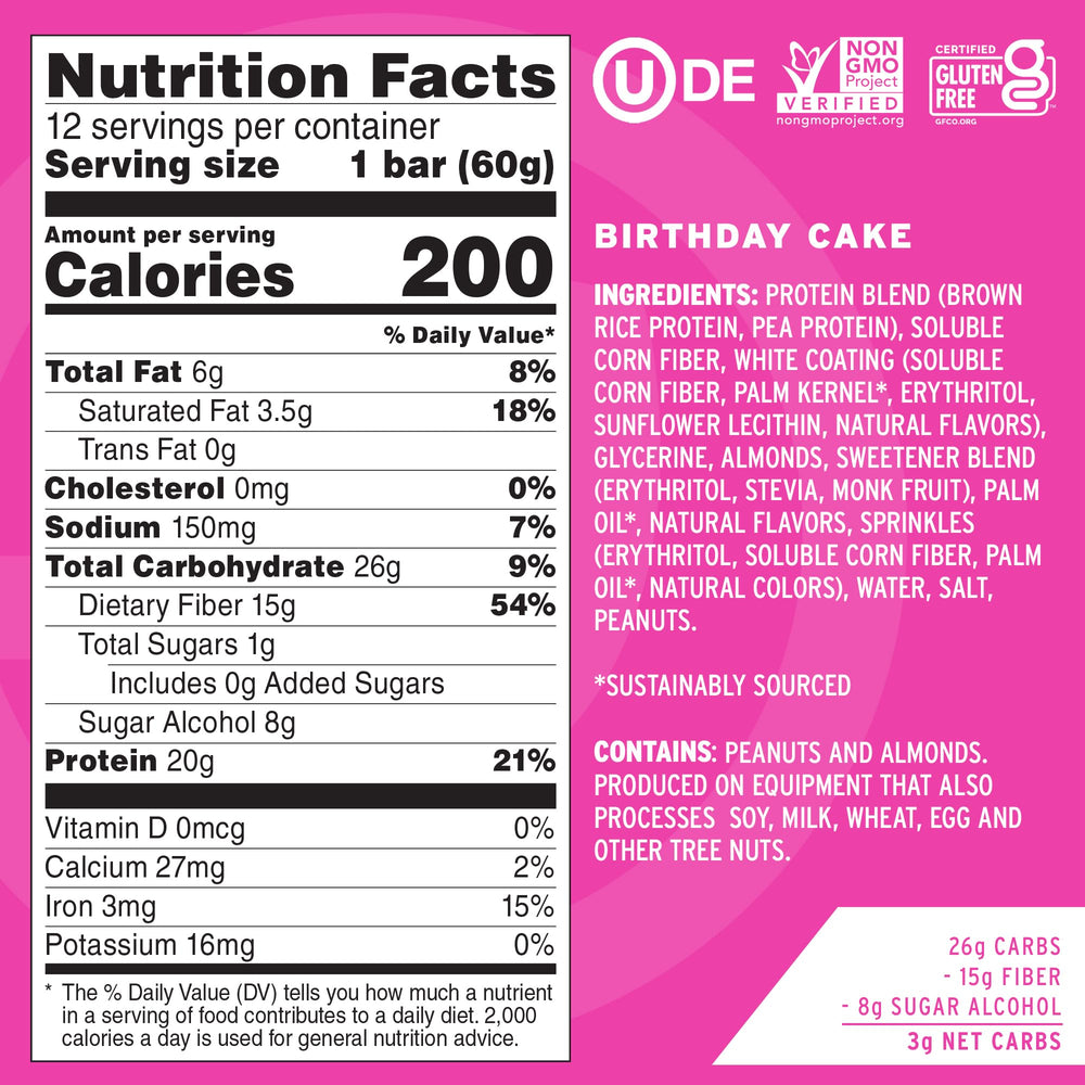 No Cow Birthday Cake bar close-up shows sprinkles and chewy texture for post-workout snacking.