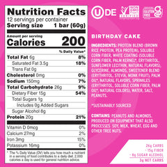 No Cow Birthday Cake bar close-up shows sprinkles and chewy texture for post-workout snacking.