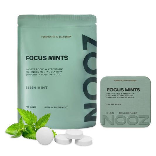 NOOZ Focus Mints refill tin on a desk offering quick mental clarity.