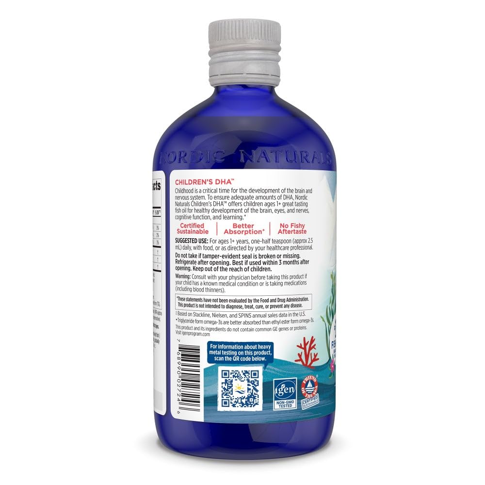 Spoon dipping into Nordic Naturals Children’s DHA strawberry for kids.