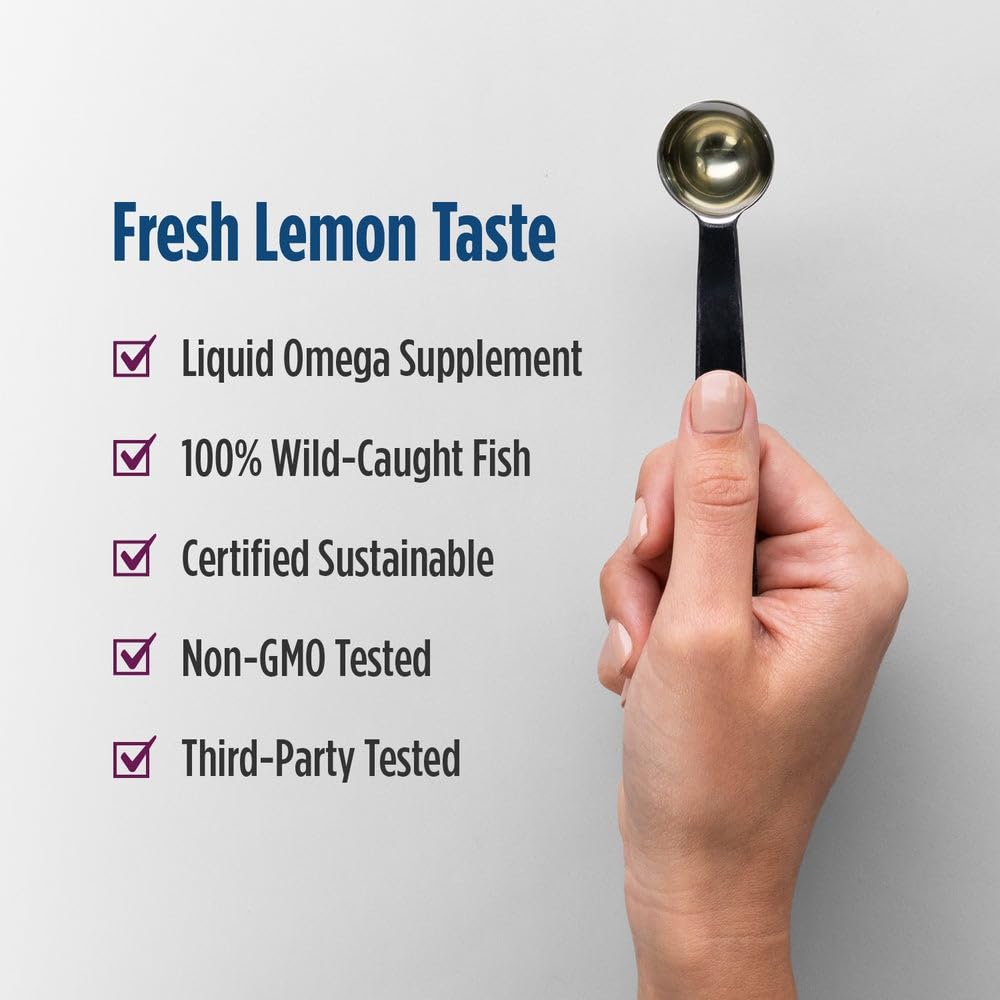Nordic Naturals Complete Omega lemon glass with drops ready for daily serving.