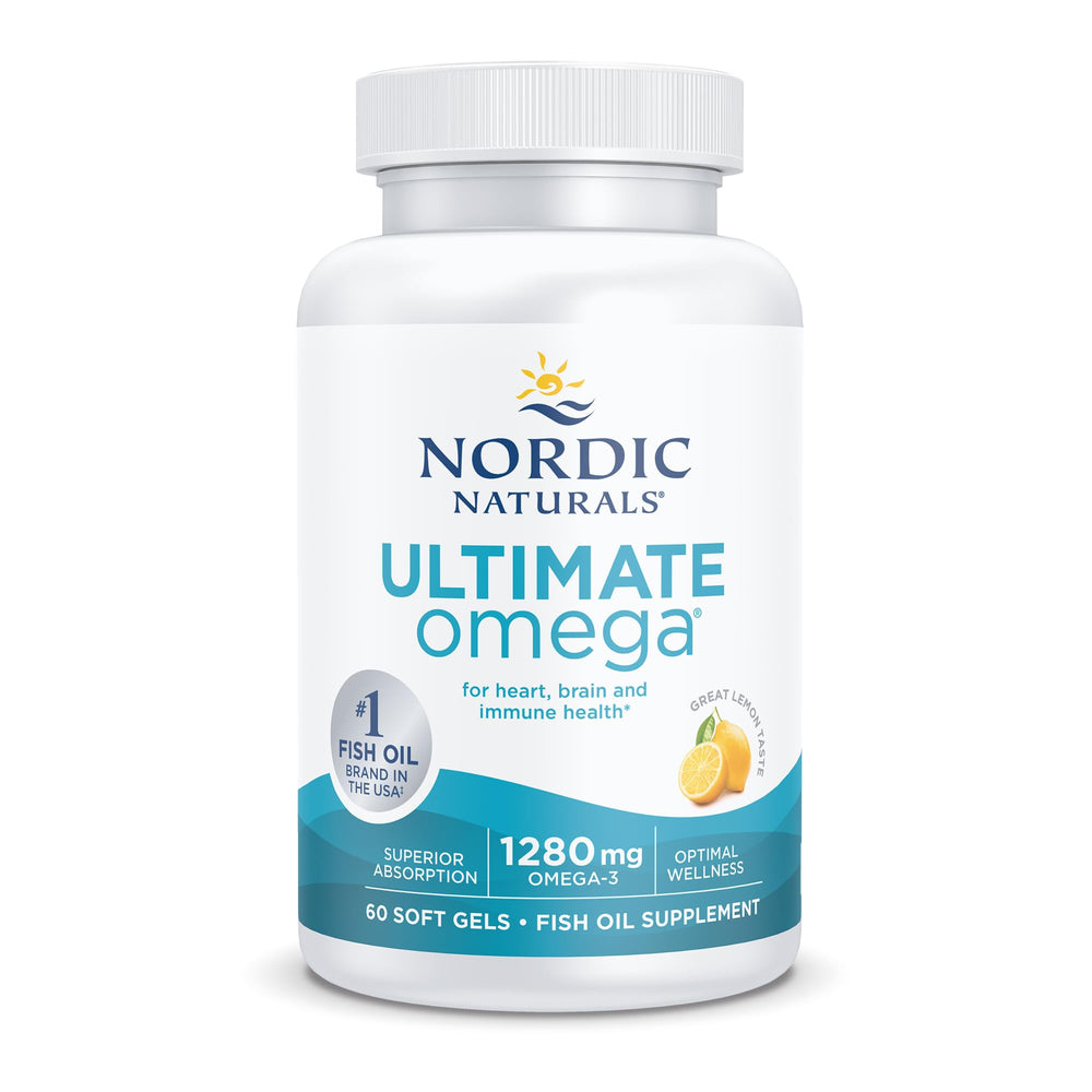 Nordic Naturals Ultimate Omega lemon gels on wooden surface with lemon slice