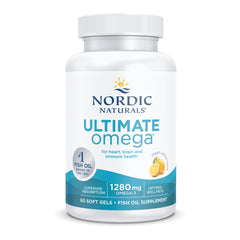 Nordic Naturals Ultimate Omega lemon gels on wooden surface with lemon slice