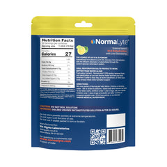NormaLyte Lemon Lime packets being poured into a glass for fast hydration.