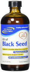 North American Herb & Spice oil dropper releasing oregano oil.
