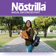 Nostrilla nasal spray in hands ready for on-the-go congestion relief