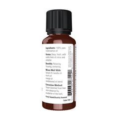 NOW Foods Frankincense oil amber glass close-up highlights pure steam-distilled extract.