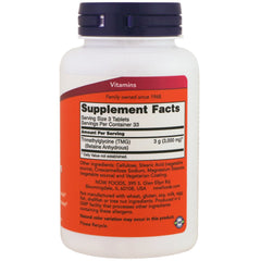 NOW Foods TMG tablets close-up, easy-to-swallow supplement.