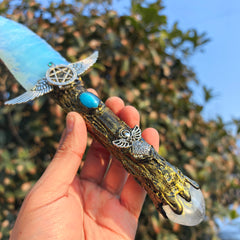 NsmjodStone opal obsidian piece as a unique spiritual tool for reflection.