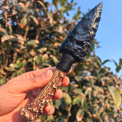 NsmjodStone obsidian crystal with resin handle offers decorative appeal.
