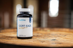 Cort-Eaze in hand to show convenient two-capsule serving