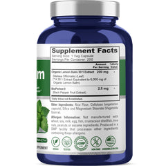 Close-up of NusaPure lemon balm capsules showing 6000 mg equivalent per capsule