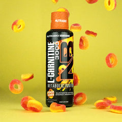 Pouring NutraBio L-Carnitine Shot for fast absorption and clean energy.