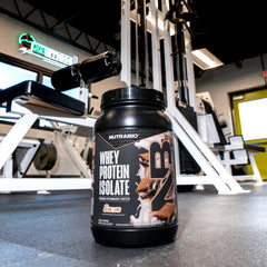 NutraBio Whey Isolate label close-up highlights clean, non-GMO formula