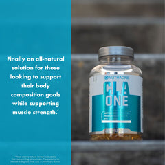 NutraOne CLAOne bottle and glass set up for a simple supplementation routine.
