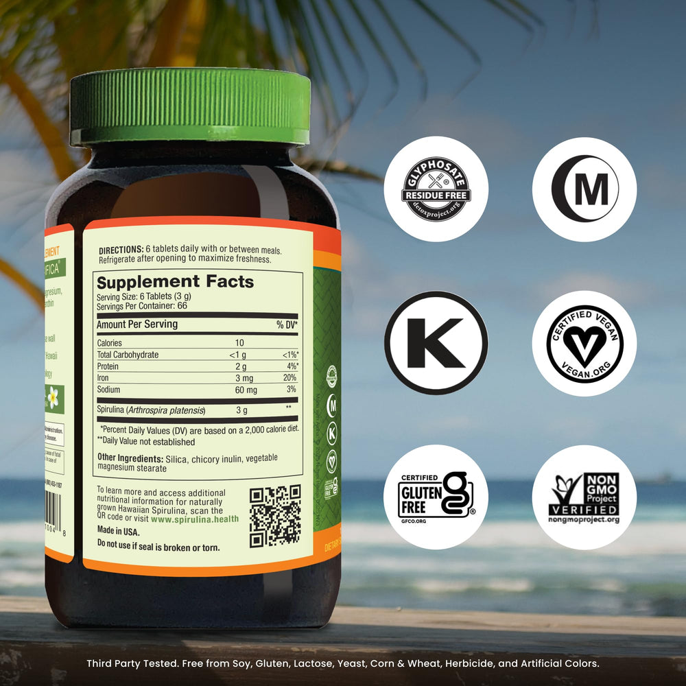 Nutrex Hawaii Pure Hawaiian Spirulina bottle open with tablets – convenient daily intake.