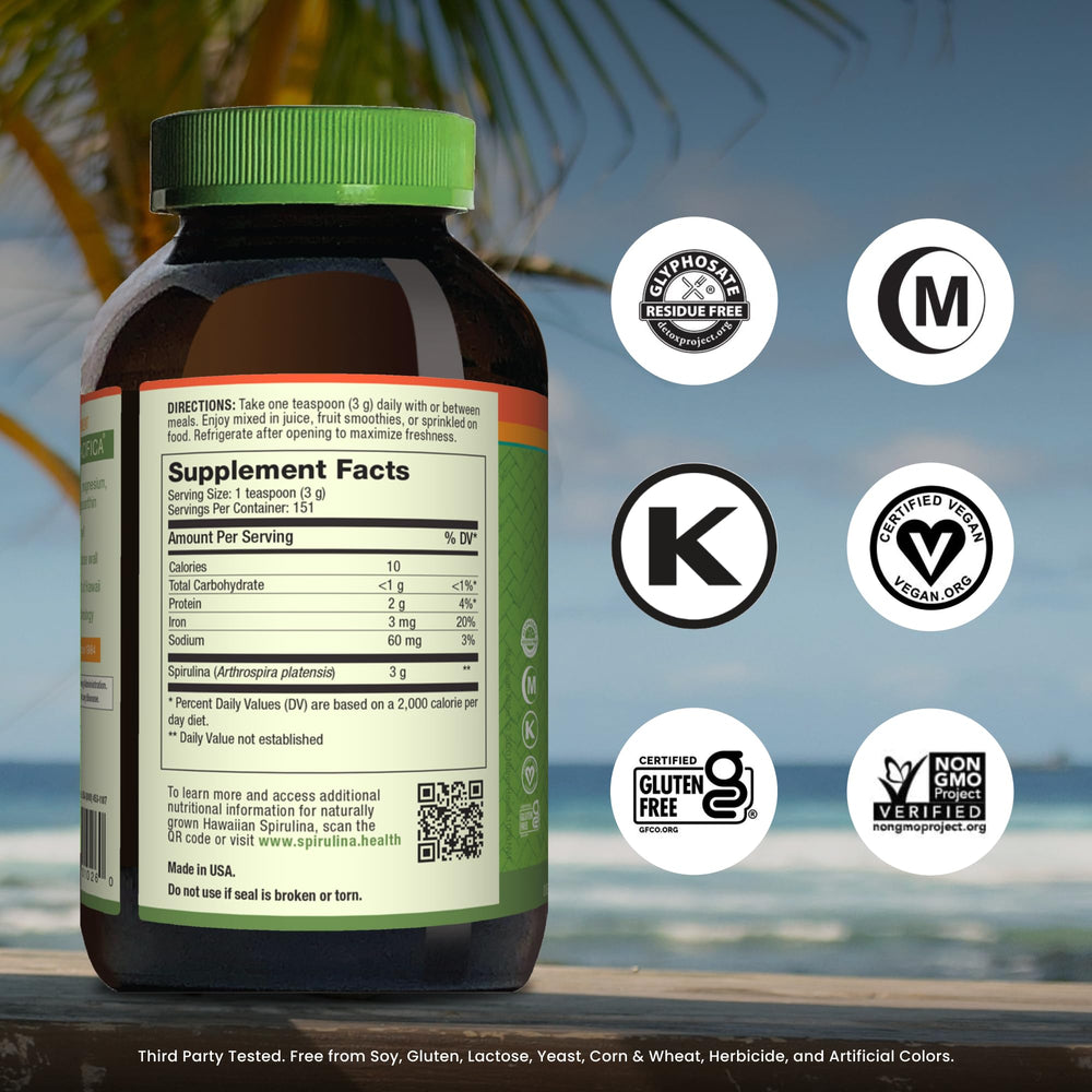 Nutrex Hawaii spirulina powder scoop illustrates easy daily serving for plant-based protein.
