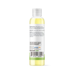 Applying Nutricost Vitamin E Oil to skin for hydration and conditioning.