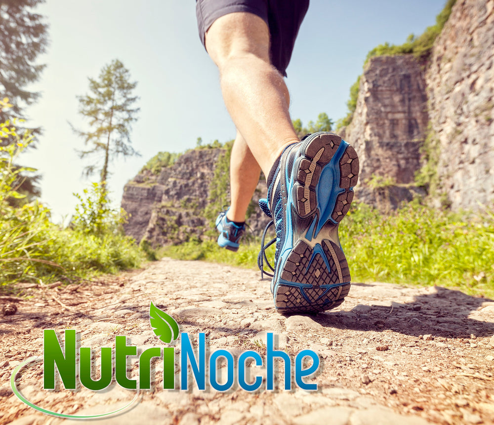 NutriNoche gold liquid drops on a spoon, emphasizing precise dosing.