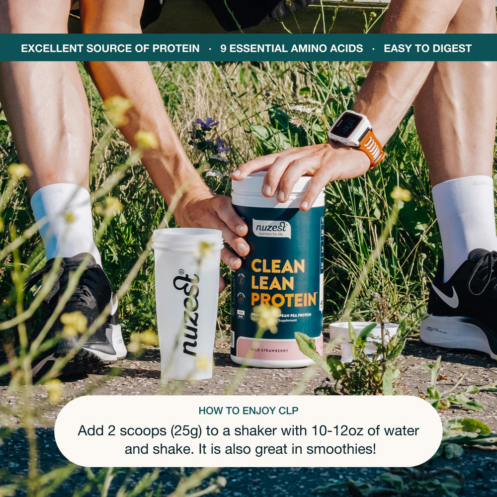 Nuzest pea protein powder on a kitchen counter for easy use.