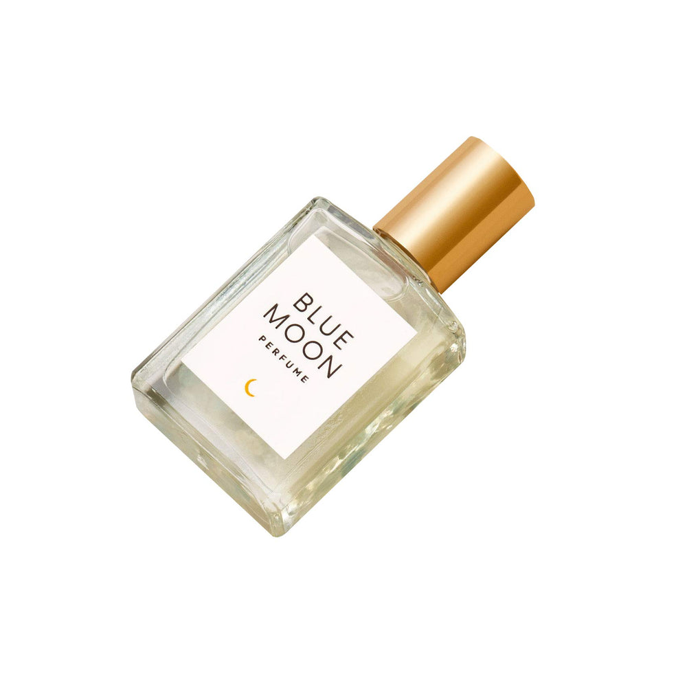 Olivine Atelier Blue Moon perfume oil bottle pouring for daily wear
