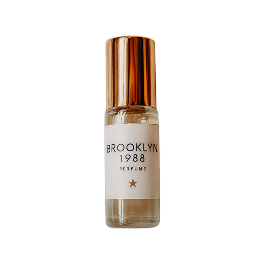 Olivine Atelier Brooklyn 1988 mini bottle pour demonstrates a refined, long-lasting aroma for travel