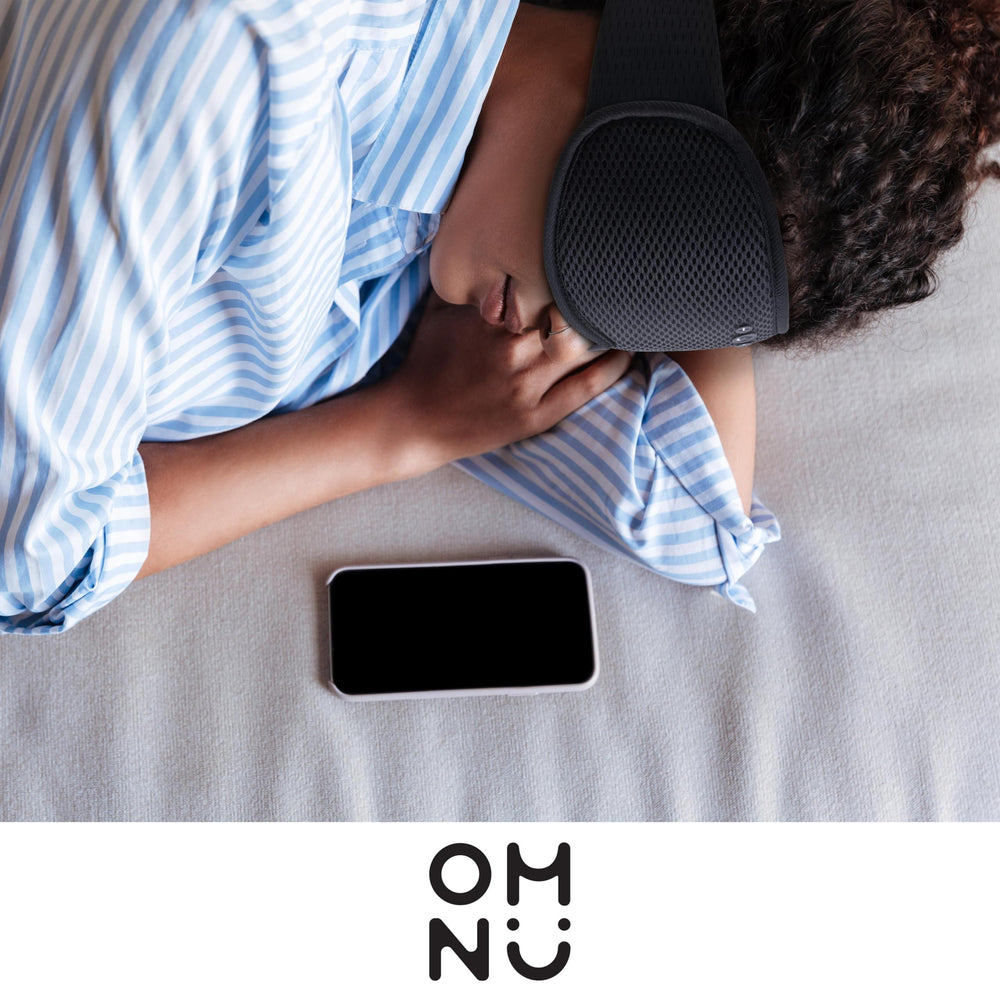 Lightweight OMNU headphones designed for travel and meditation
