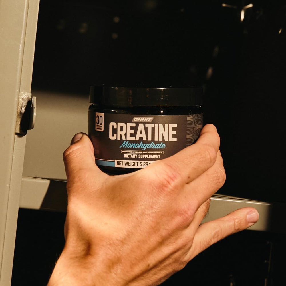 Scoop beside the ONNIT creatine monohydrate powder indicating precise portions