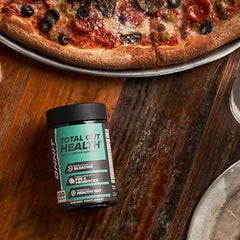 ONNIT Total GUT HEALTH packaging visual communicates a 120-count daily regimen.