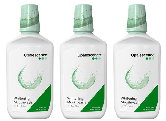 Opalescence whitening mouthwash bottle with cool mint label for daily whitening and fresh breath.