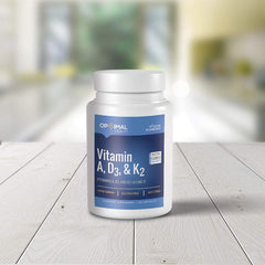 OPTIMALHEALTH Vitamin ADK daily-use bottle on table ready for everyday supplementation.