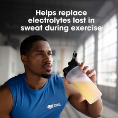 Optimum Nutrition Amino Energy scoop dispensing a measured serving.